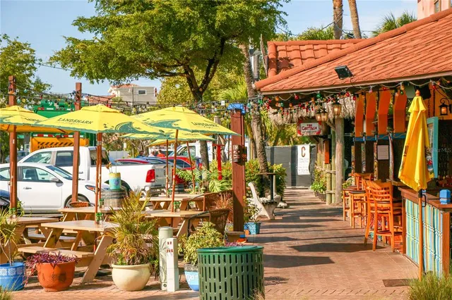 an aerial view of a city with ocean view
