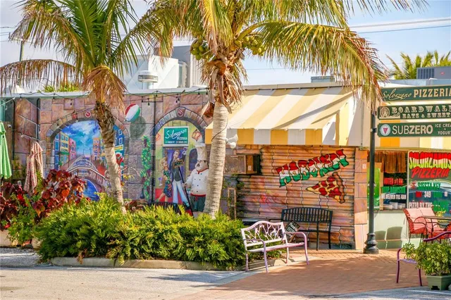 an aerial view of a house with a lake view
