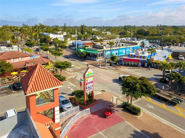 an aerial view of city and lake