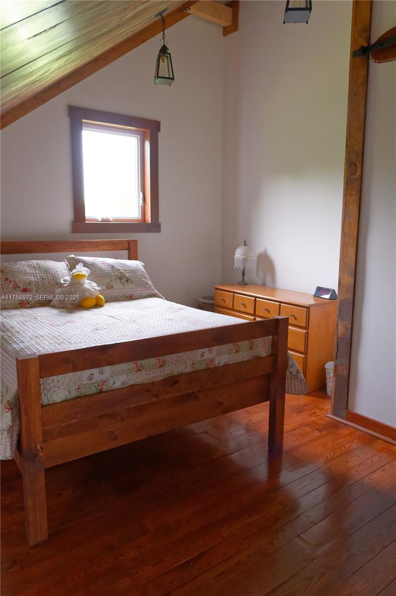 1150 10e Rang undefined, QC J0K 1Z0 - Photo 15 of 42 a bed sitting in a bedroom next to a window