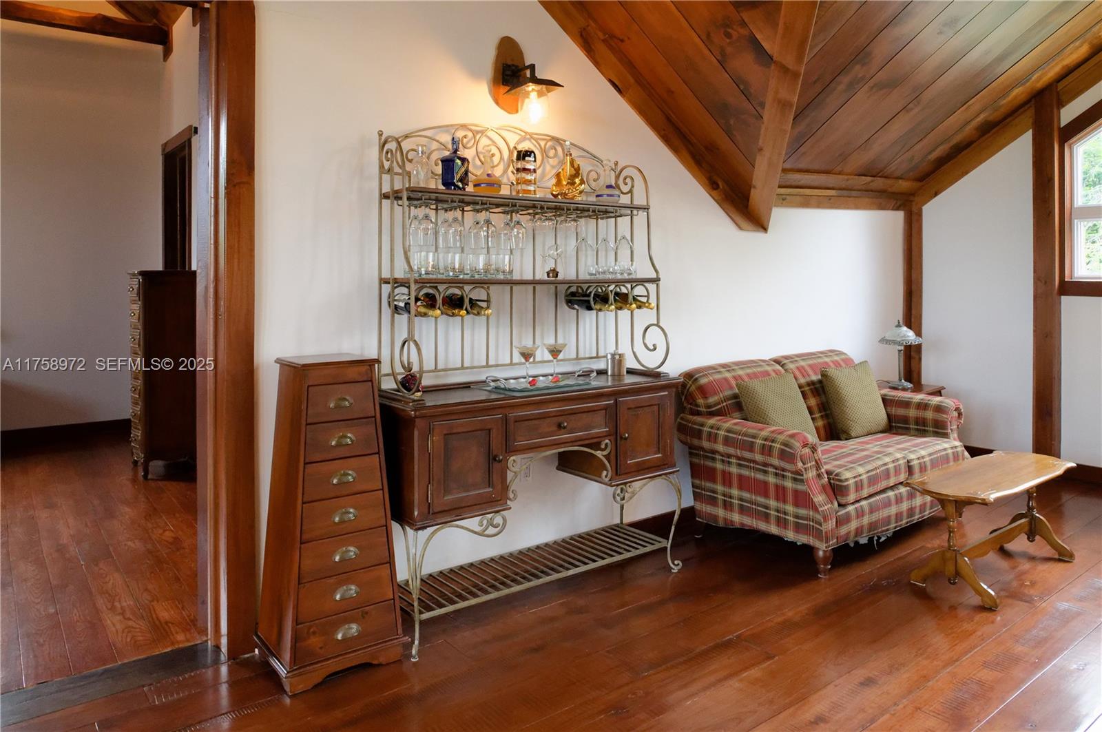 1150 10e Rang undefined, QC J0K 1Z0 - Photo 17 of 42 a living room with furniture and a wooden floor