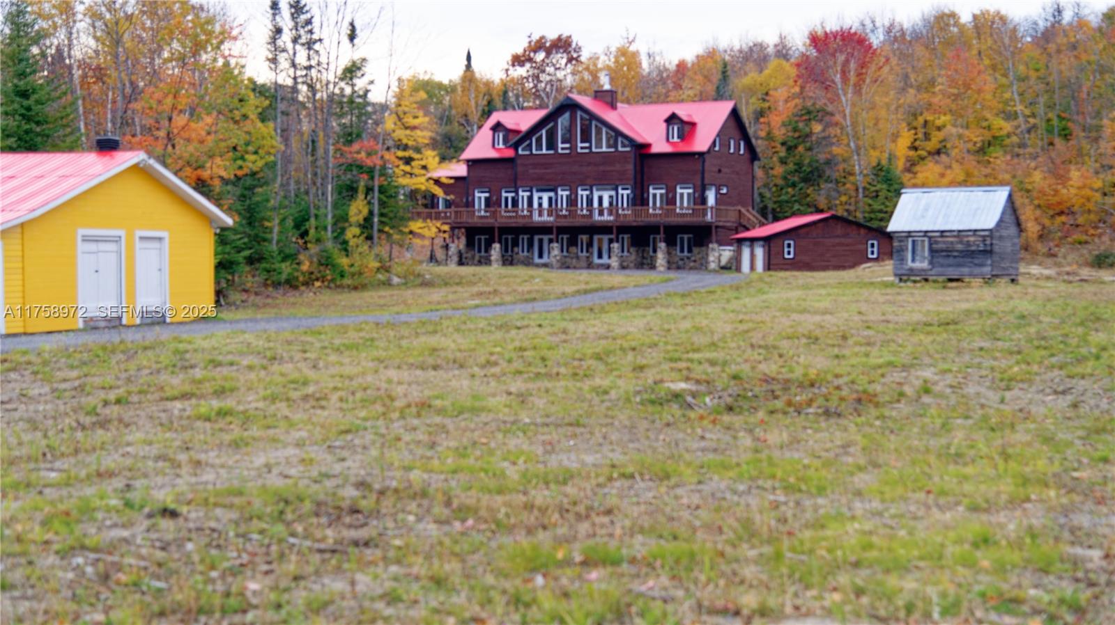 1150 10e Rang undefined, QC J0K 1Z0 - Photo 29 of 42 a view of a house with a yard and a garage