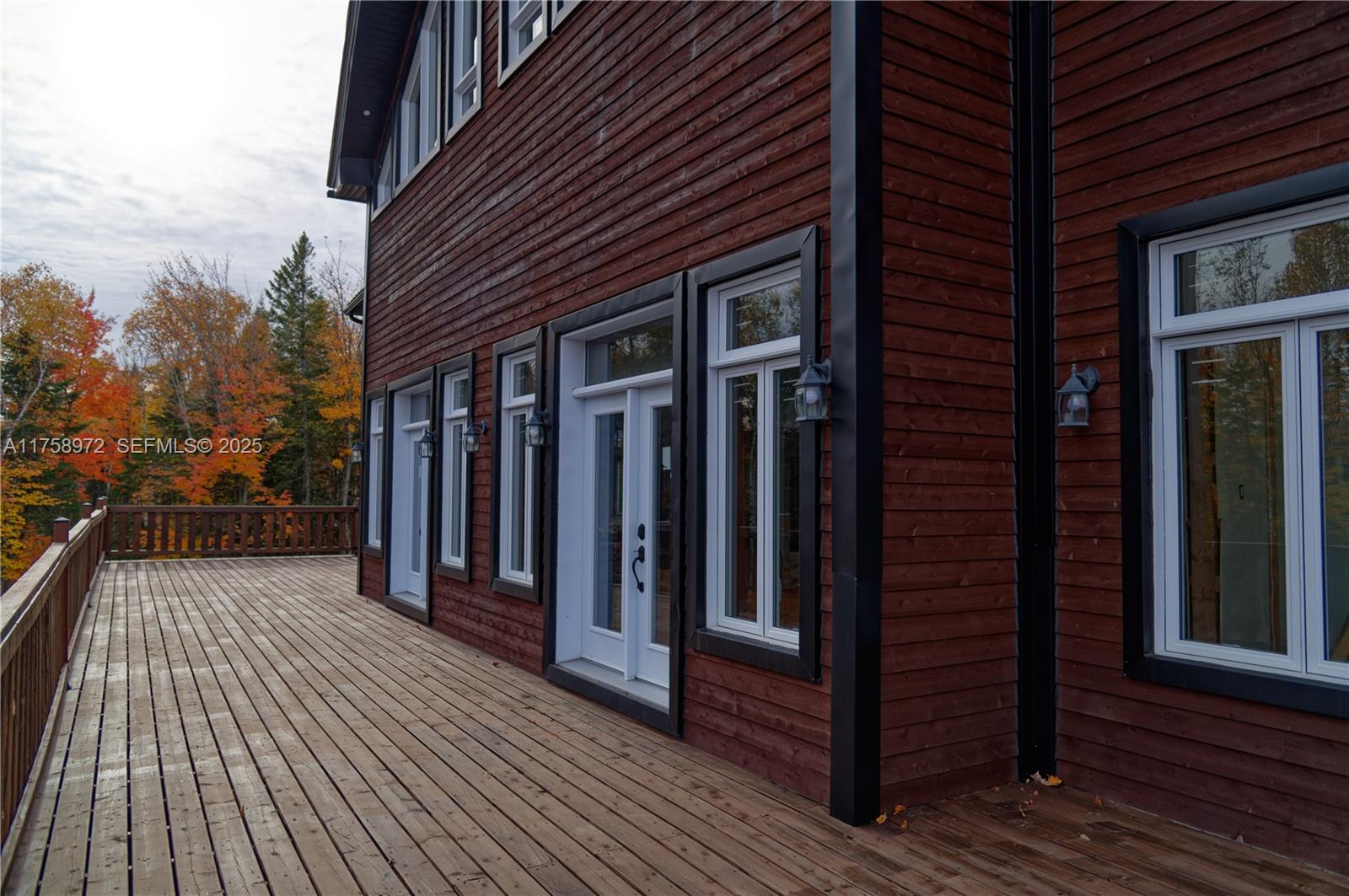 1150 10e Rang undefined, QC J0K 1Z0 - Photo 30 of 42 a view of a house with backyard and wooden floor