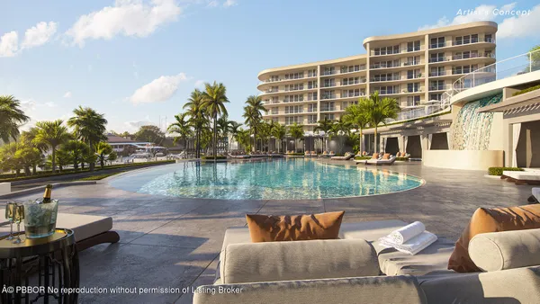 a view of swimming pool with outdoor seating