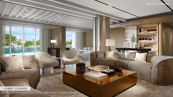 a living room with furniture and floor to ceiling windows