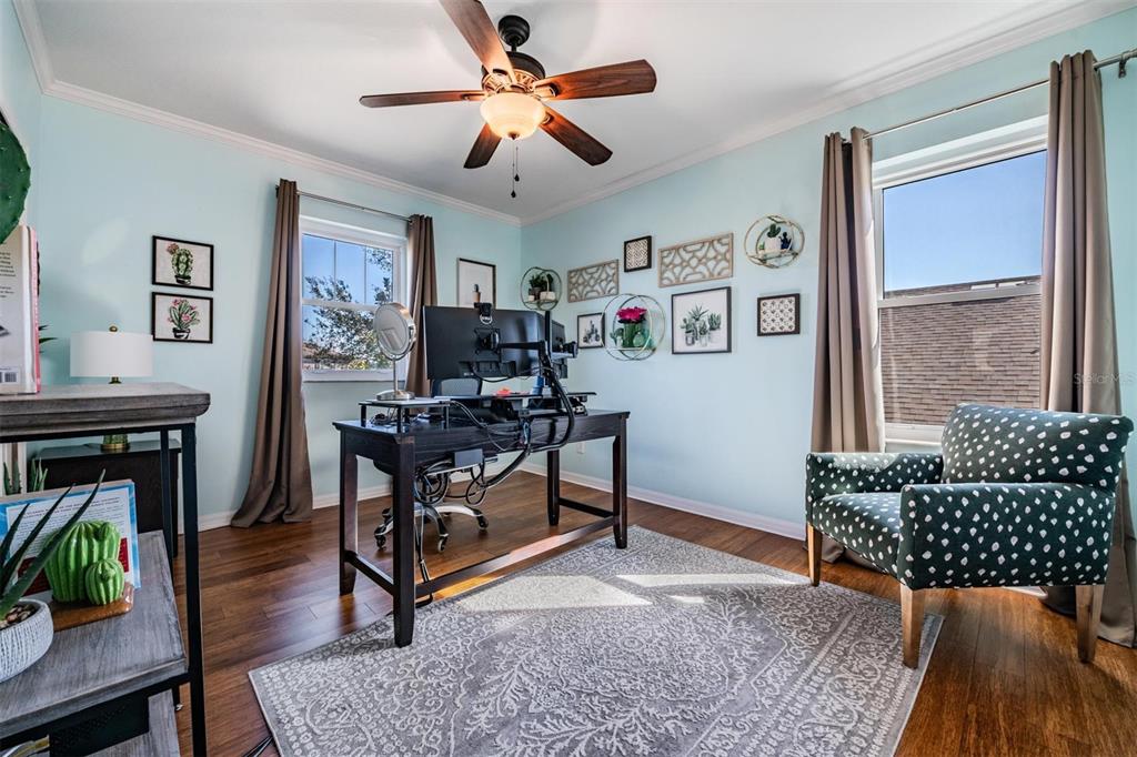 12902 Tikal Way Trinity, FL 34655 - Photo 24 of 43 a living room with furniture and a window