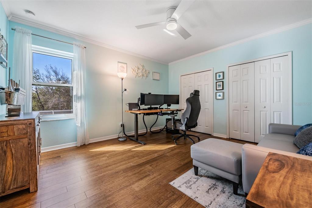 12902 Tikal Way Trinity, FL 34655 - Photo 26 of 43 a view of a livingroom with workspace and a window