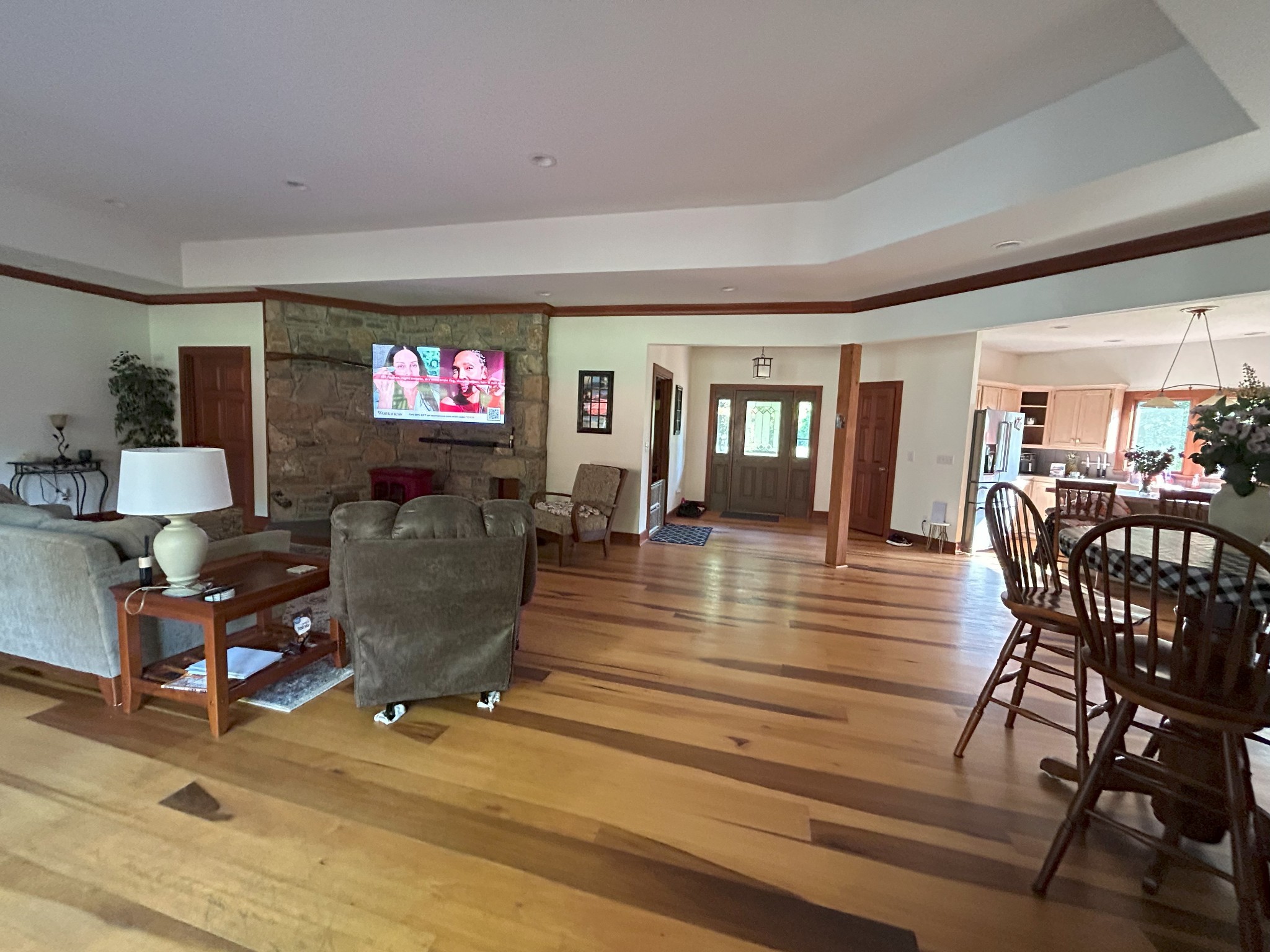 6960 Millersburg Road Christiana, TN 37037 - Photo 13 of 68 a living room with furniture a dining table and chairs with wooden floor