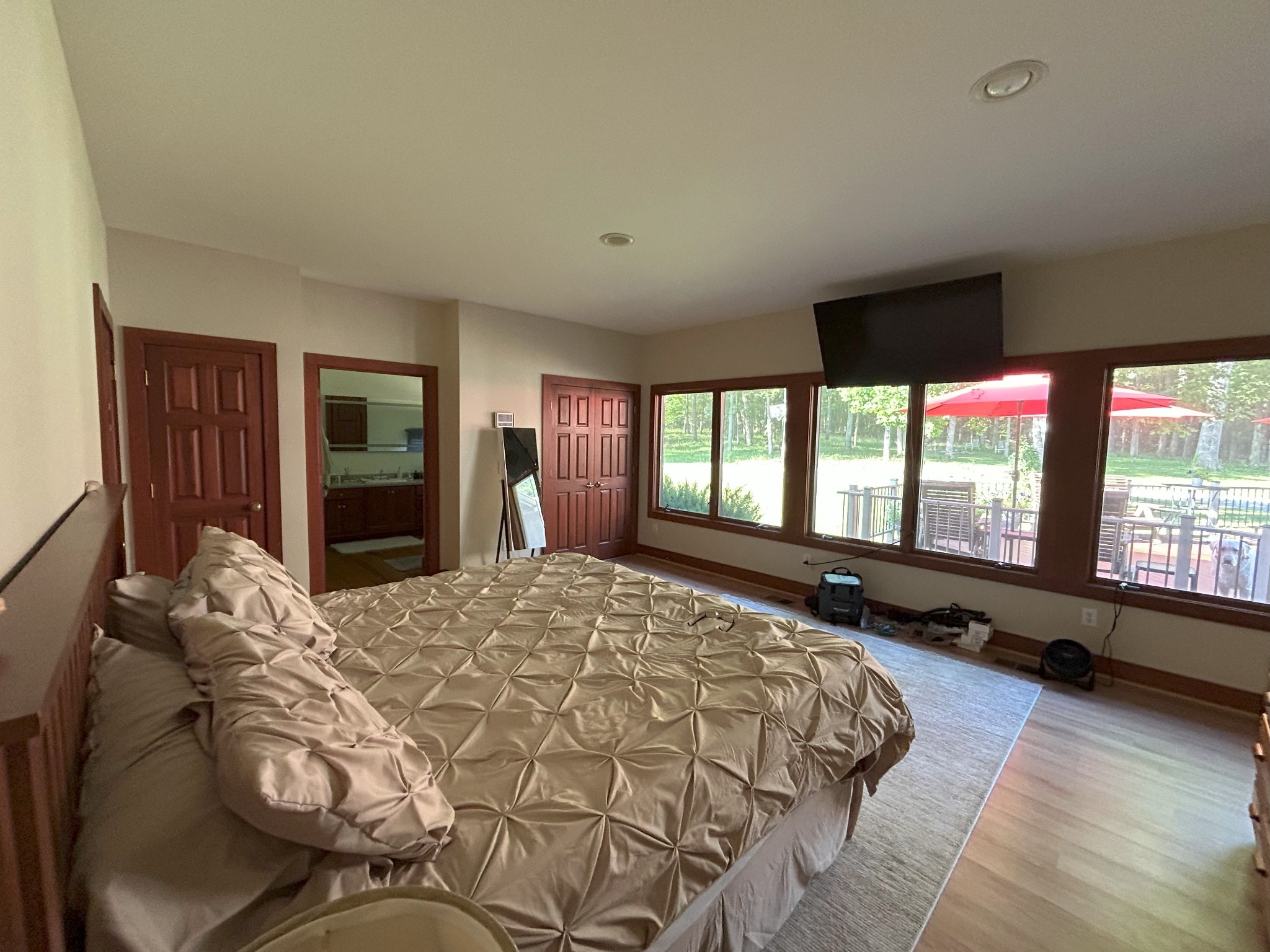 6960 Millersburg Road Christiana, TN 37037 - Photo 17 of 68 a bed sitting in a spacious bedroom next to a window