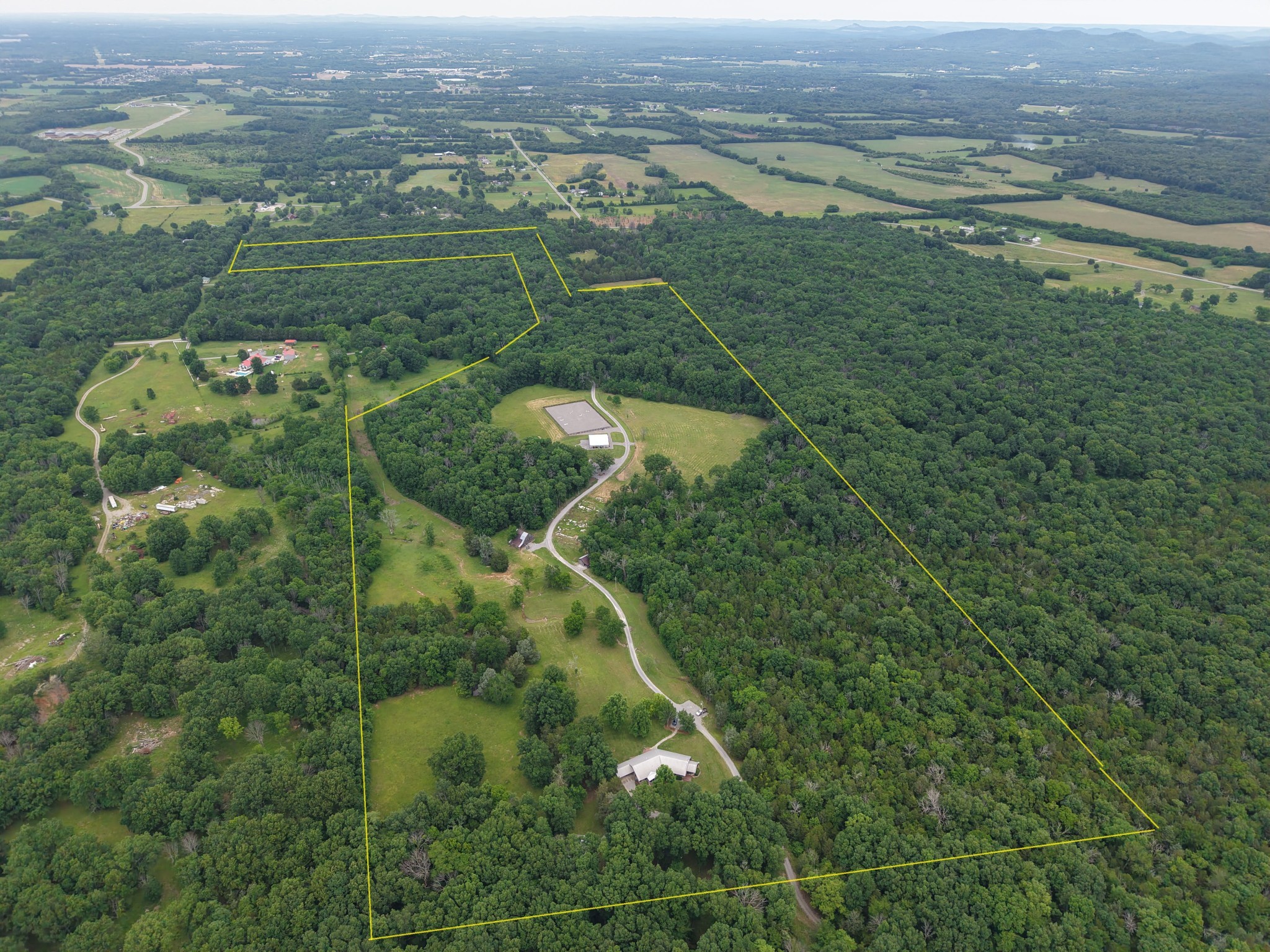 6960 Millersburg Road Christiana, TN 37037 - Photo 68 of 68 an aerial view of residential houses with outdoor space and trees