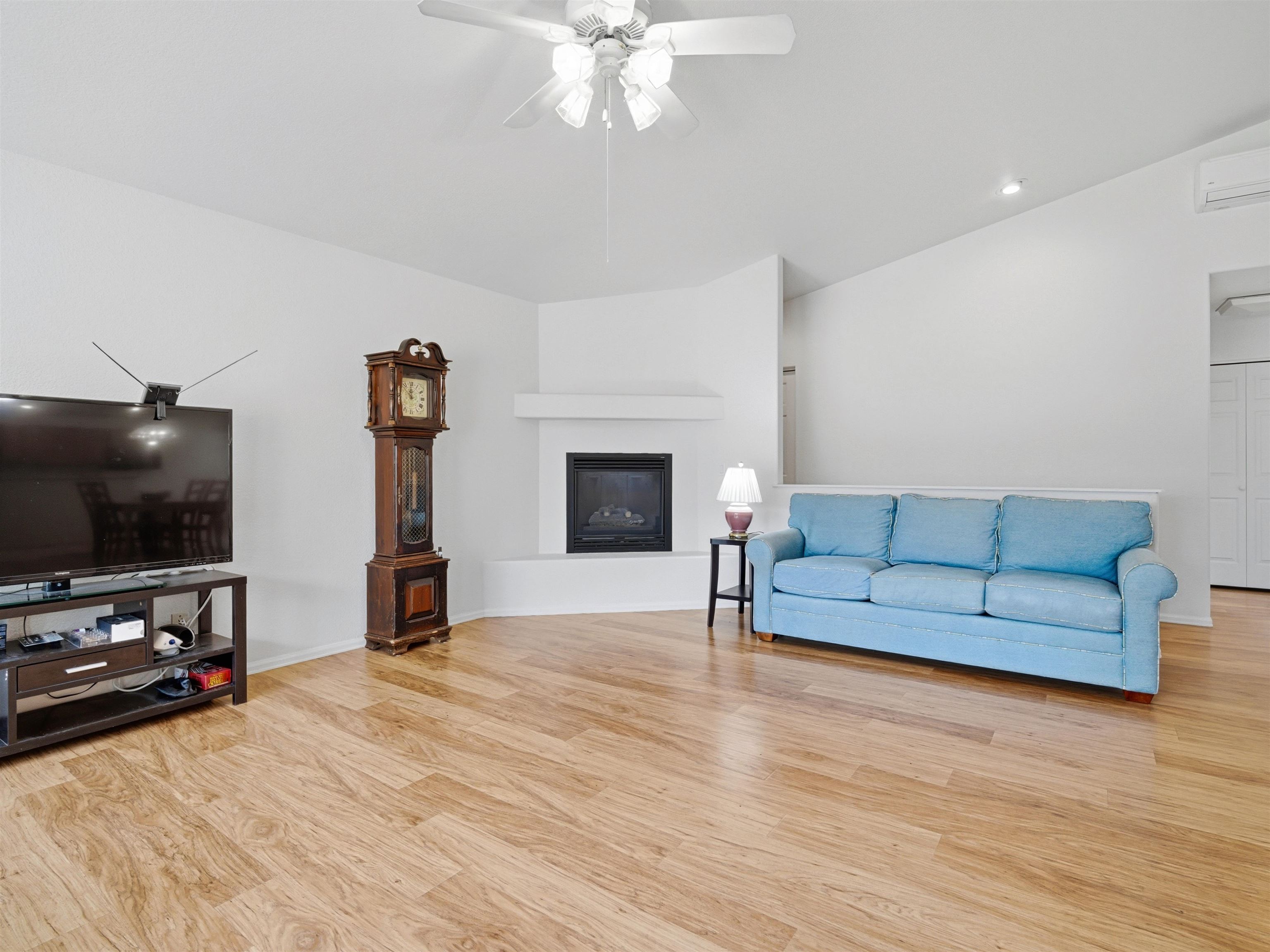 3082 Shadowbrook Court Grand Junction, CO 81504 - Photo 5 of 28 a living room with furniture and a flat screen tv