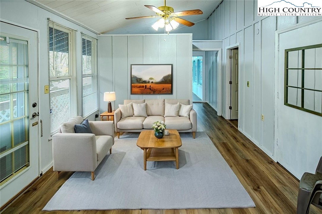 261 Black Pine Road Newland, NC 28657 - Photo 14 of 41 a living room with furniture and wooden floor