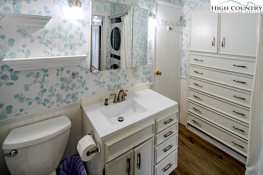 261 Black Pine Road Newland, NC 28657 - Photo 23 of 41 a bathroom with a sink toilet and mirror