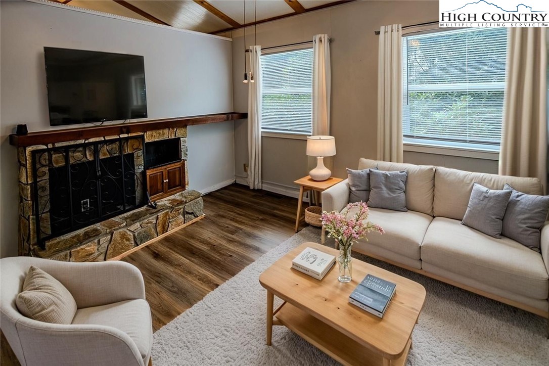 261 Black Pine Road Newland, NC 28657 - Photo 8 of 41 a living room with furniture and a flat screen tv