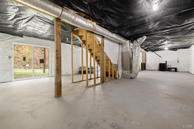 a view of water heater room with furniture