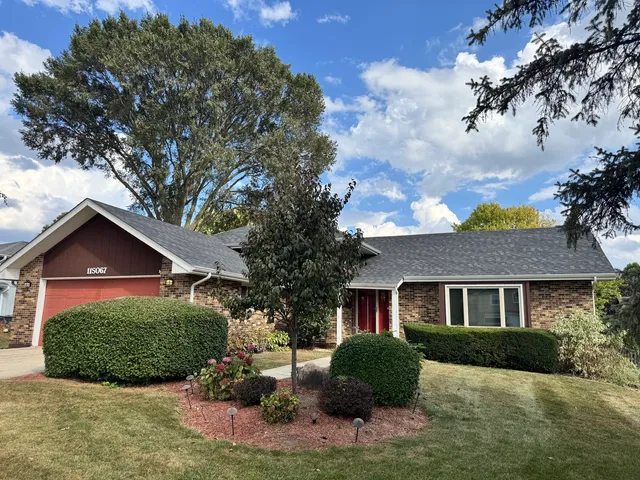 a view of a yard in front of a house