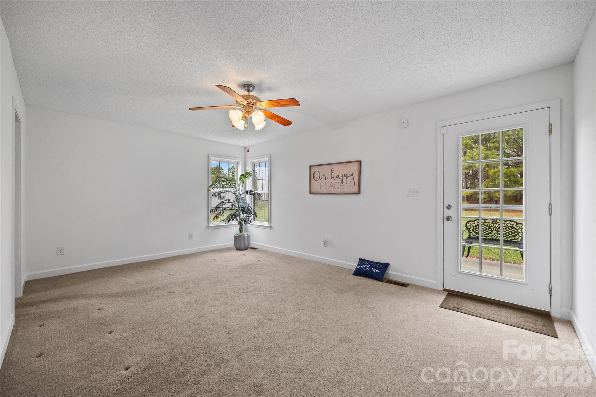 4660 Garys Place Crouse, NC 28033 - Photo 11 of 32 an empty room with windows and closet