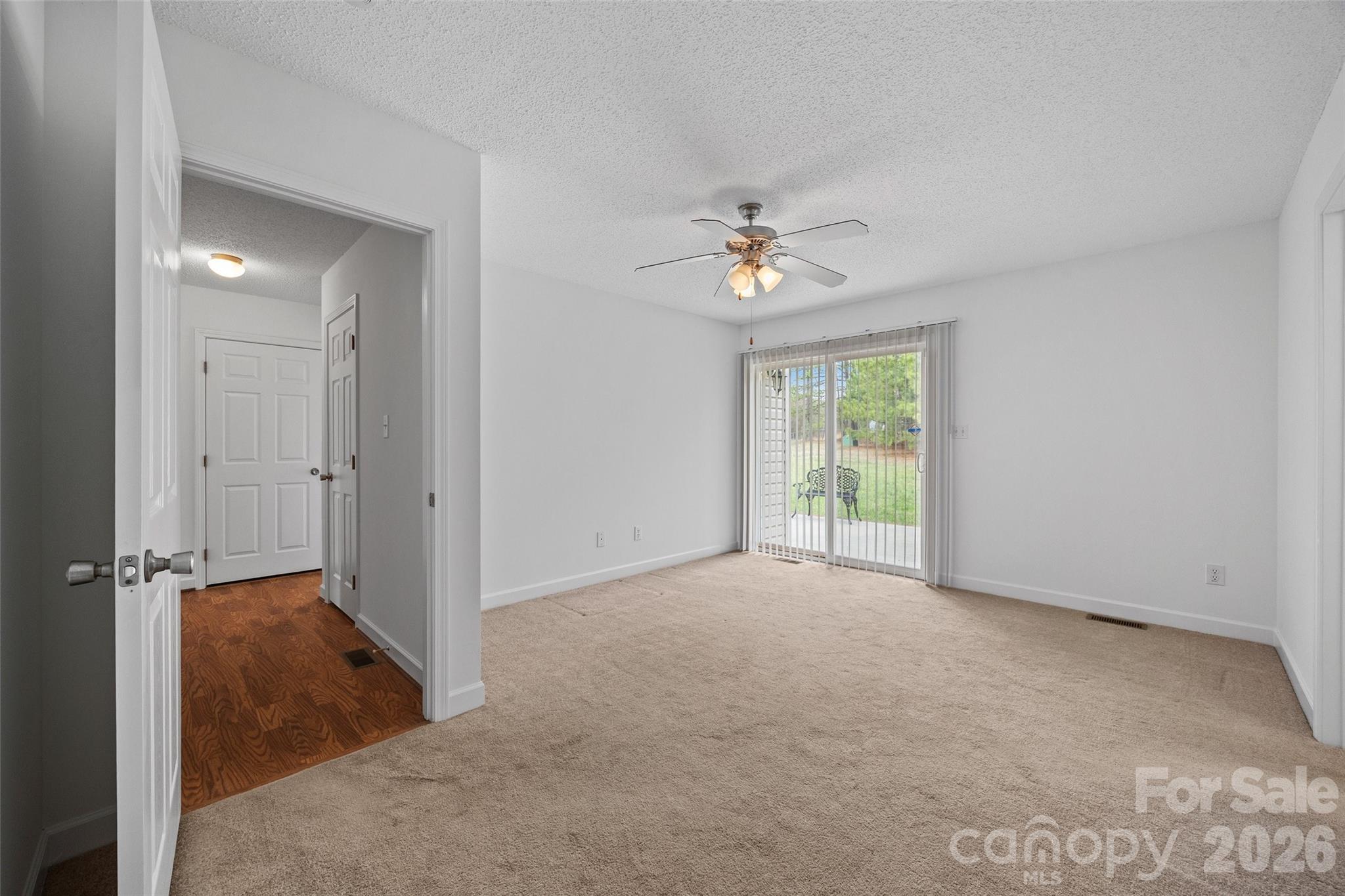 4660 Garys Place Crouse, NC 28033 - Photo 14 of 32 an empty room with windows and closet