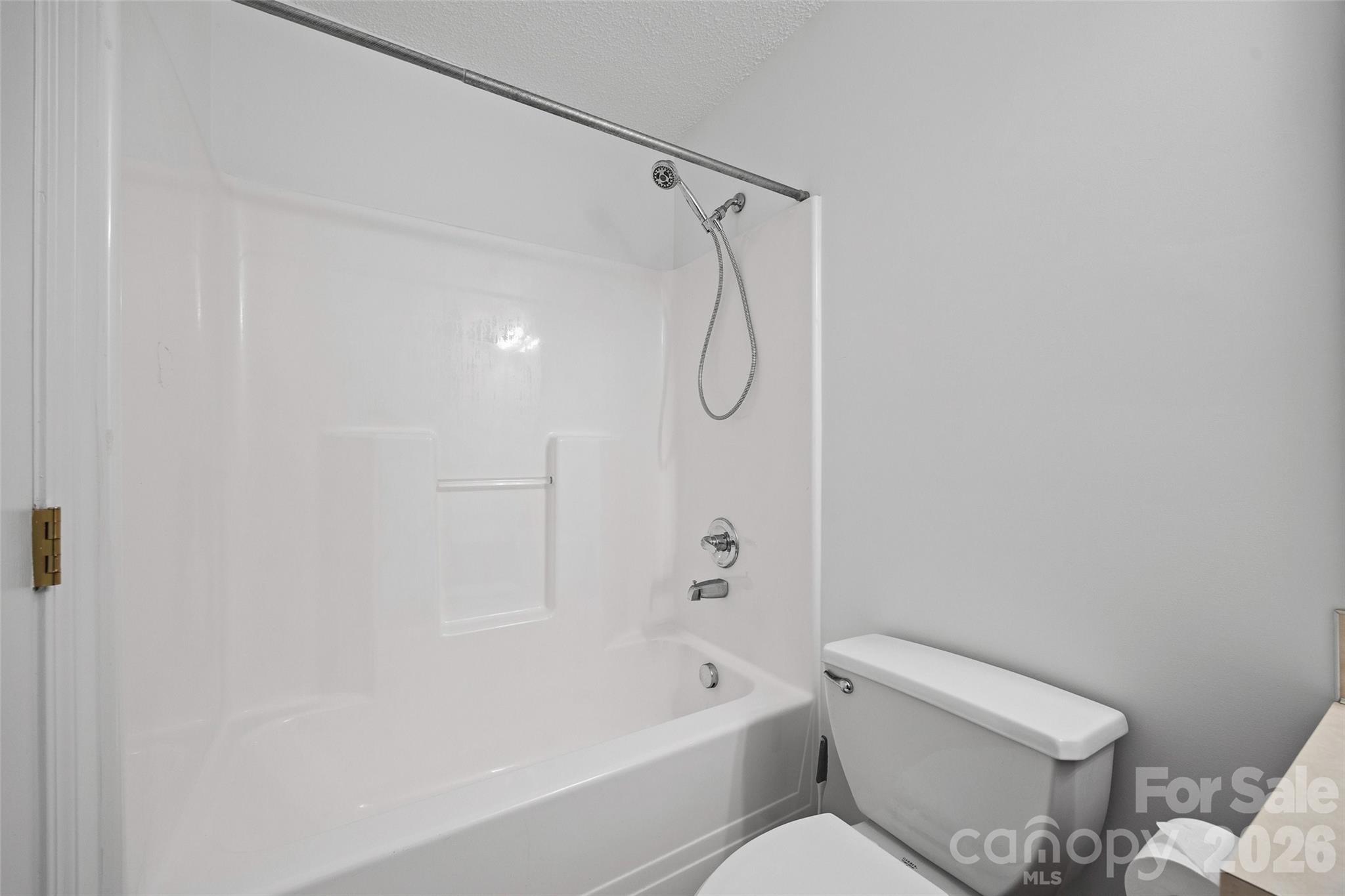 4660 Garys Place Crouse, NC 28033 - Photo 23 of 32 a bathroom with a toilet and a shower