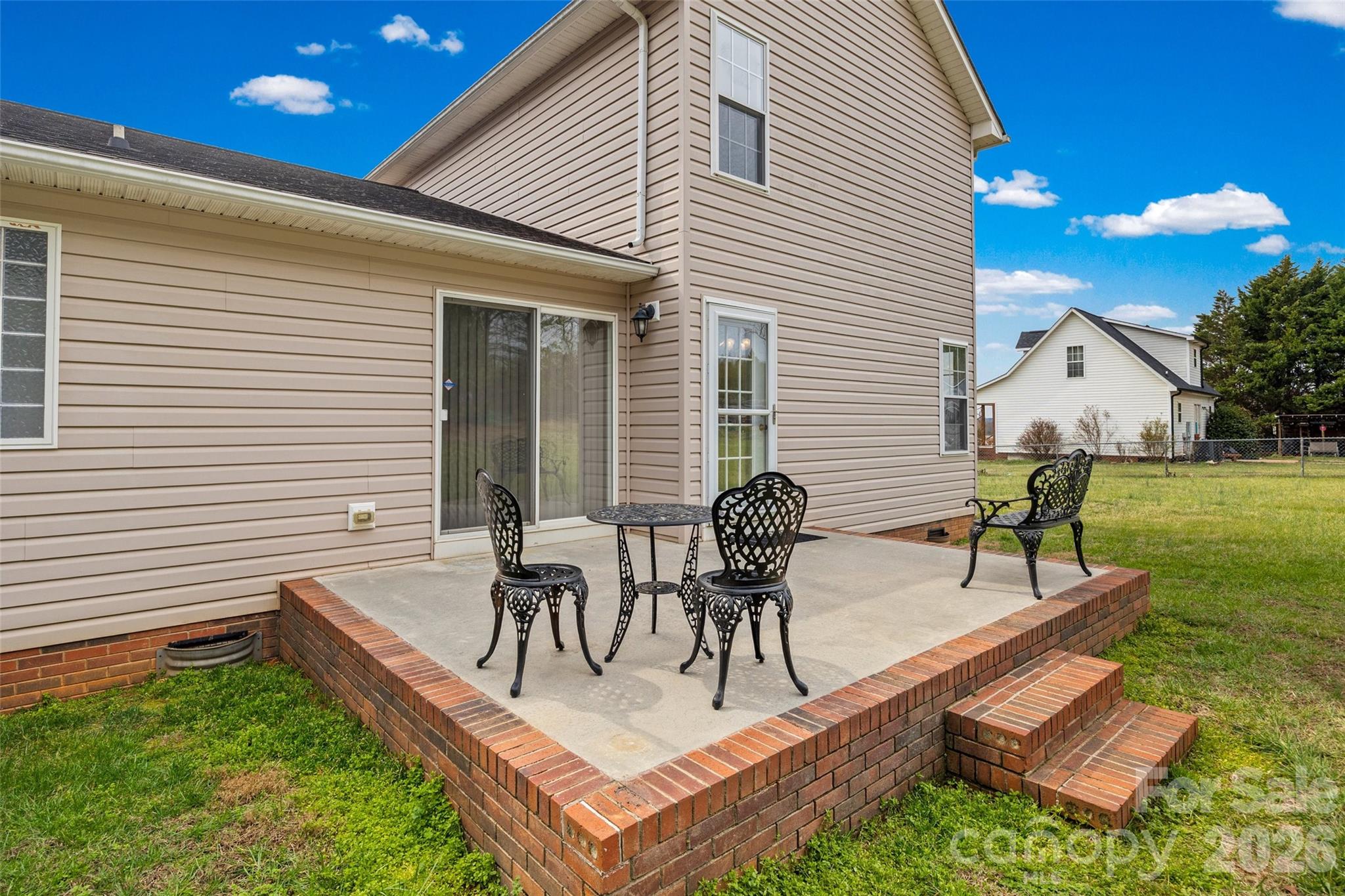4660 Garys Place Crouse, NC 28033 - Photo 24 of 32 a view of house with backyard and outdoor seating