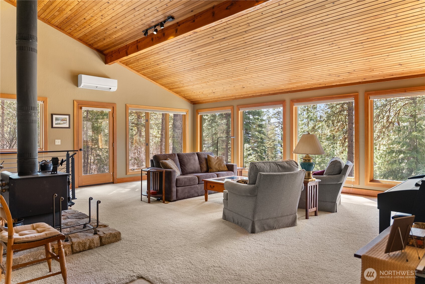 2 Trillium Road Winthrop, WA 98862 - Photo 13 of 40 a living room with furniture and large windows
