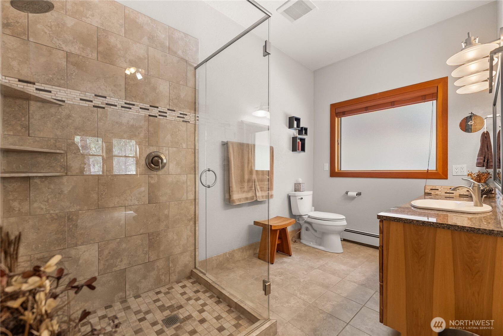 2 Trillium Road Winthrop, WA 98862 - Photo 19 of 40 a bathroom with a sink a toilet and shower