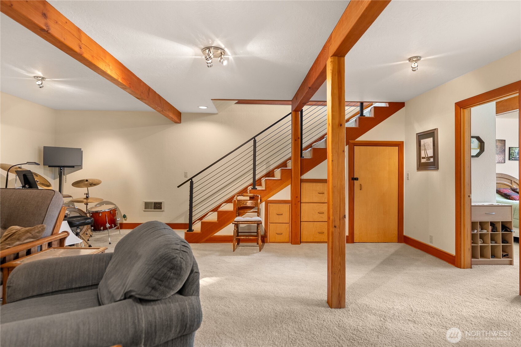 2 Trillium Road Winthrop, WA 98862 - Photo 28 of 40 a living room with lots of chairs and stairs