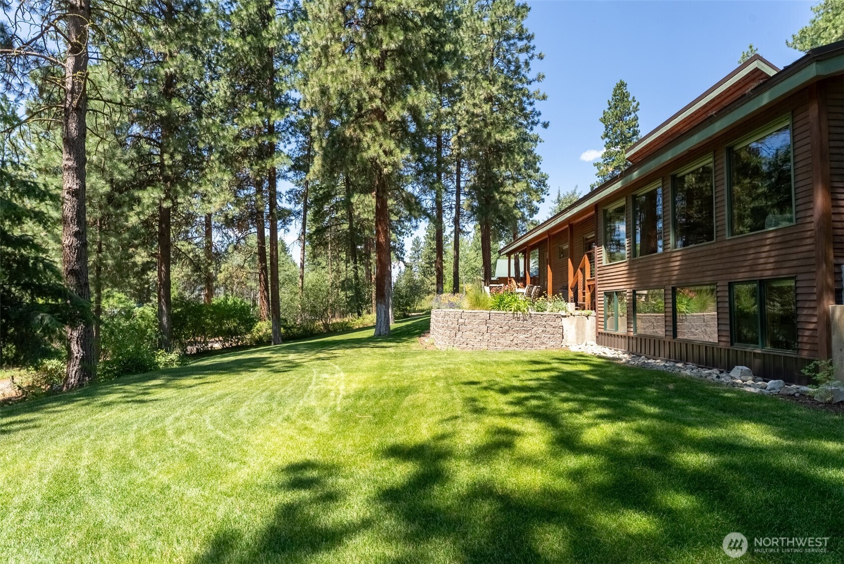 2 Trillium Road Winthrop, WA 98862 - Photo 33 of 40 a front view of a house with a yard