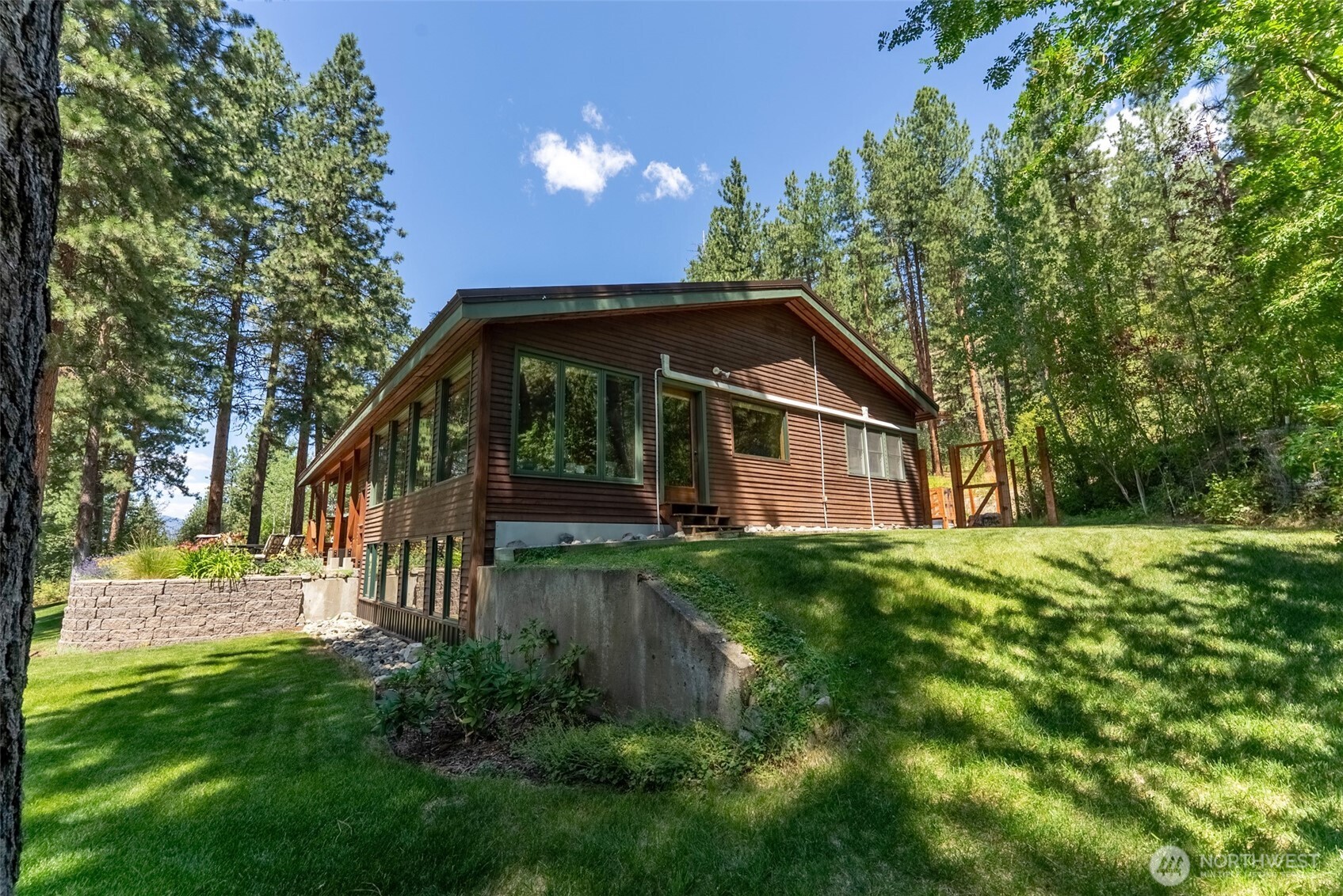 2 Trillium Road Winthrop, WA 98862 - Photo 34 of 40 a view of a house with a yard