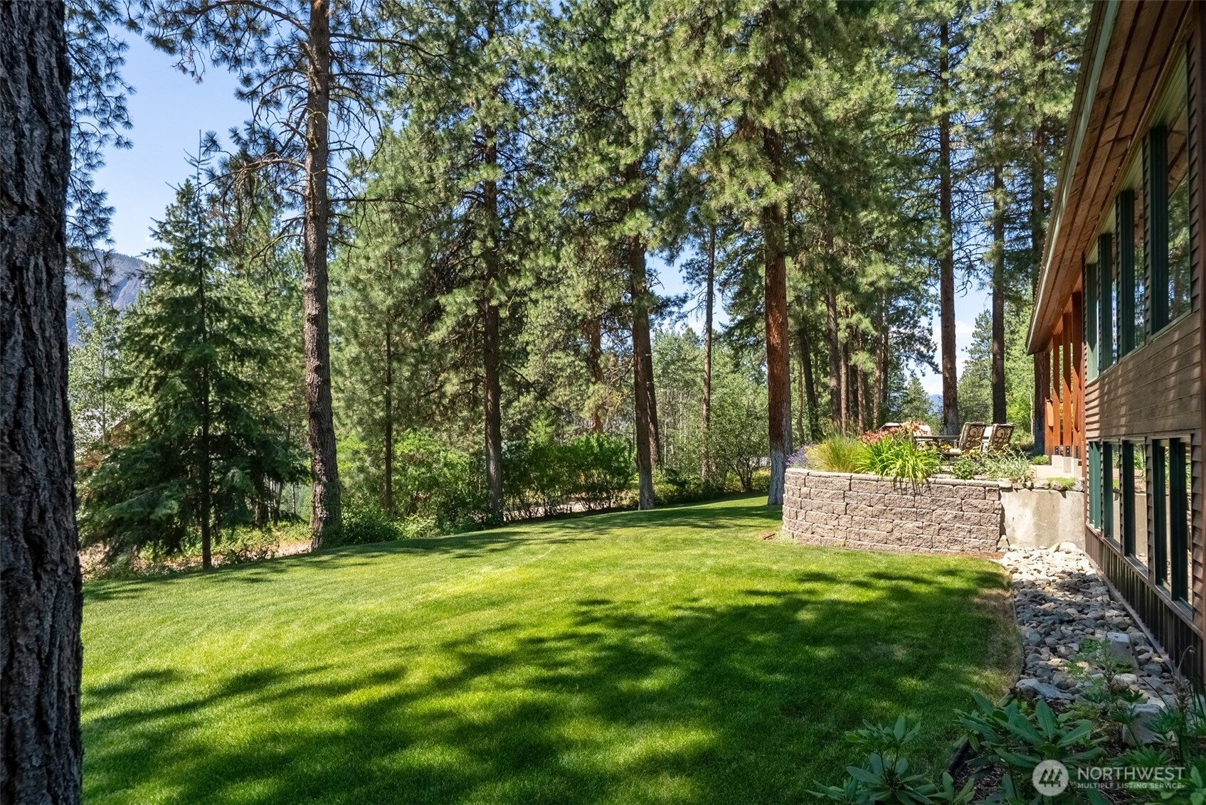 2 Trillium Road Winthrop, WA 98862 - Photo 35 of 40 a view of outdoor space with garden and trees