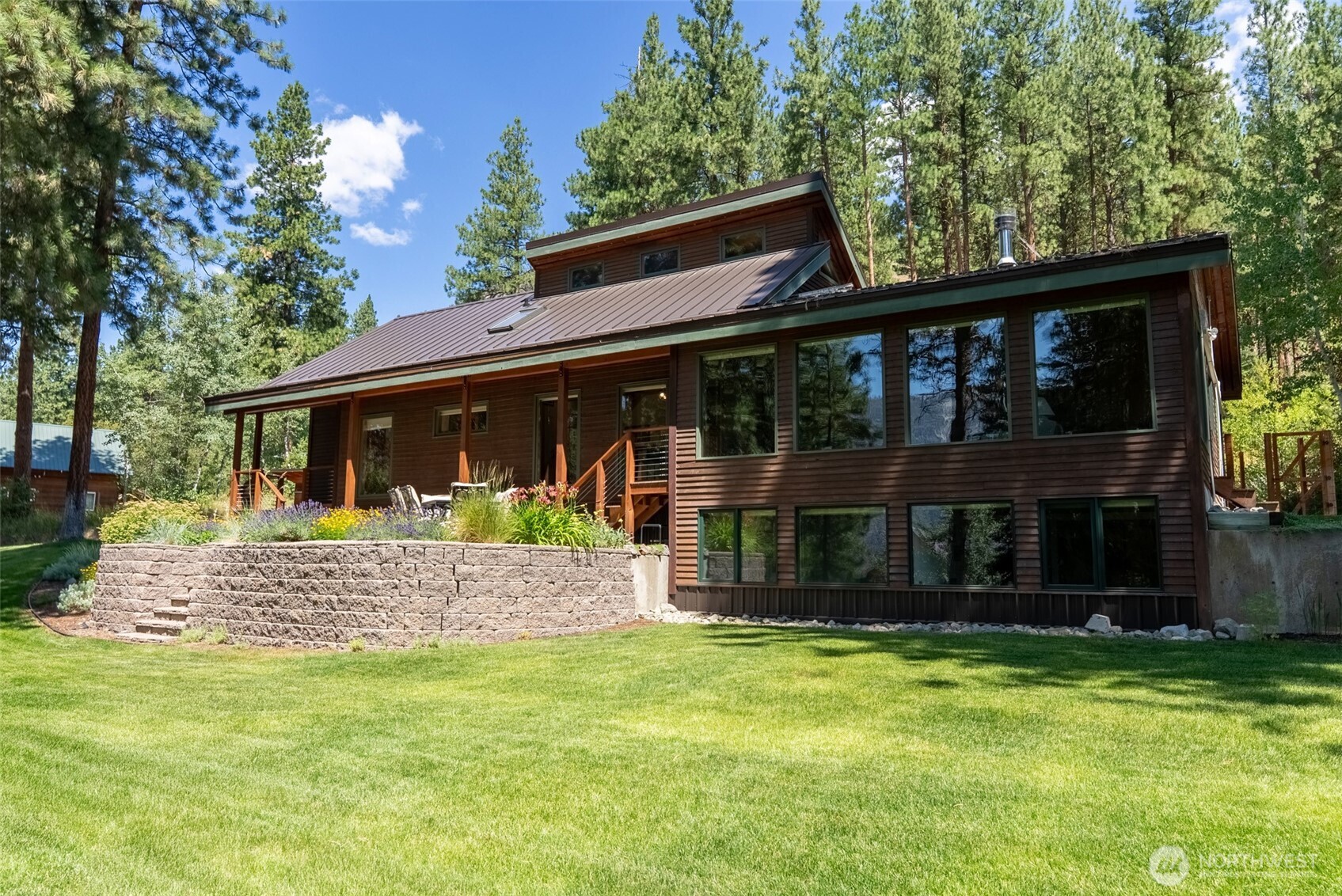 2 Trillium Road Winthrop, WA 98862 - Photo 40 of 40 a front view of house with a garden