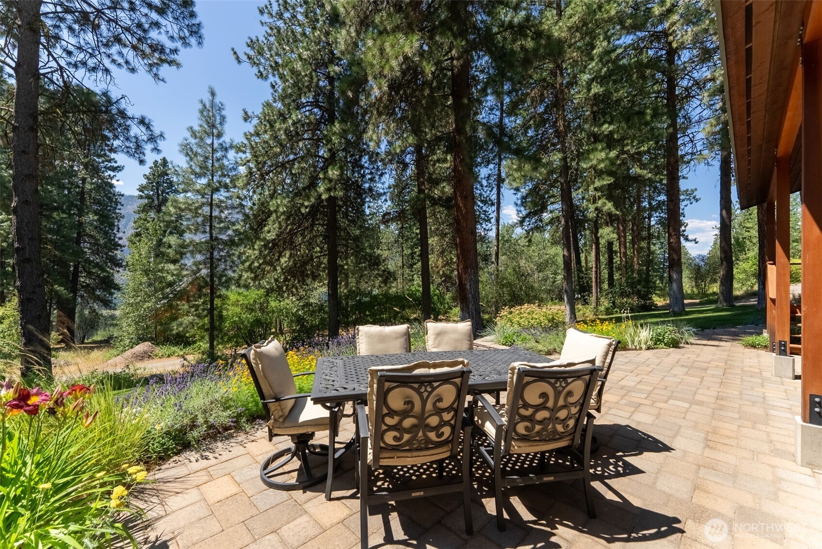 2 Trillium Road Winthrop, WA 98862 - Photo 4 of 40 a view of a patio with table and chairs and potted plants