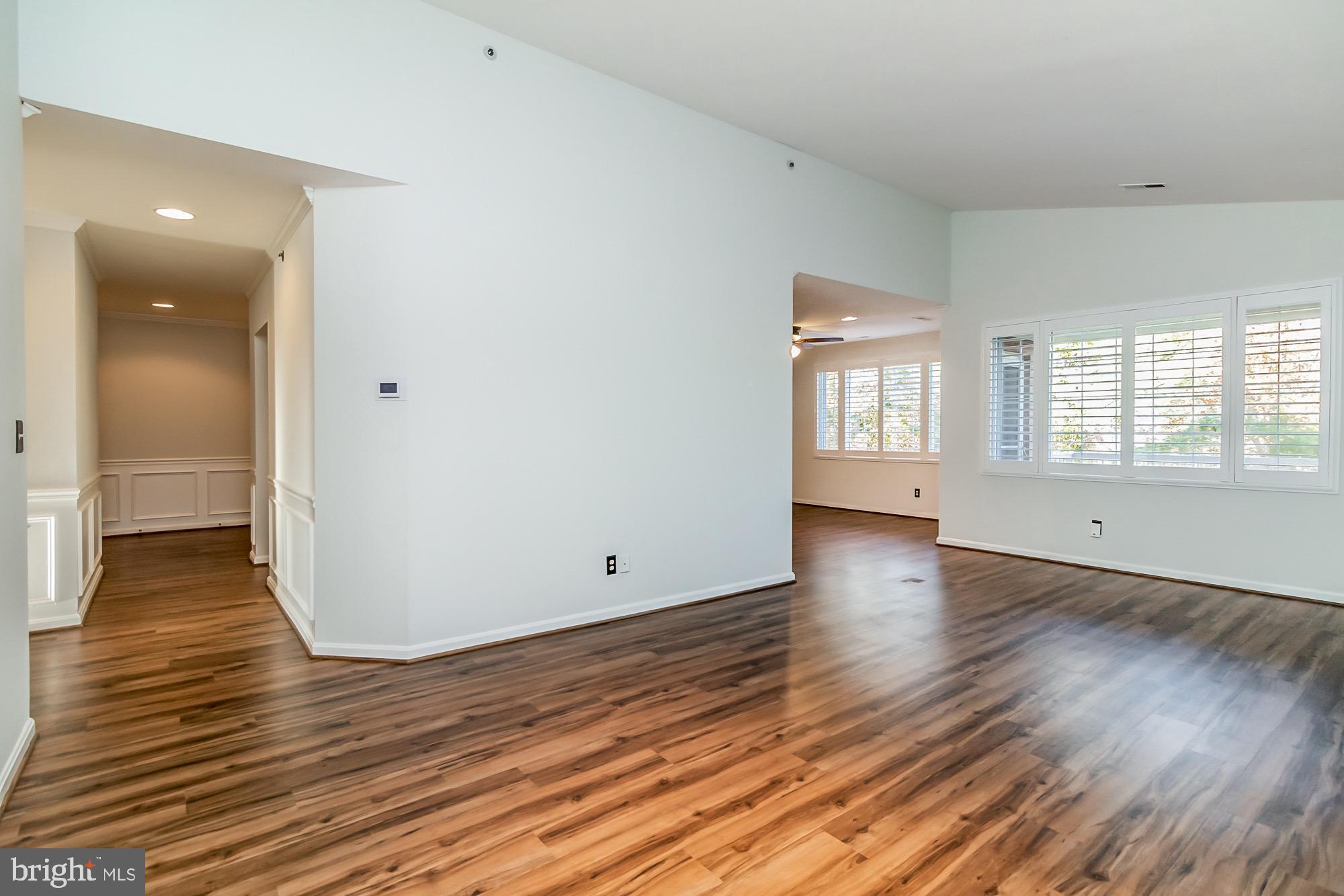 400 Kilree Road, Unit 302 Lutherville-Timonium, MD 21093 - Photo 11 of 23 Large Living Room /Plantation shutters everywhere