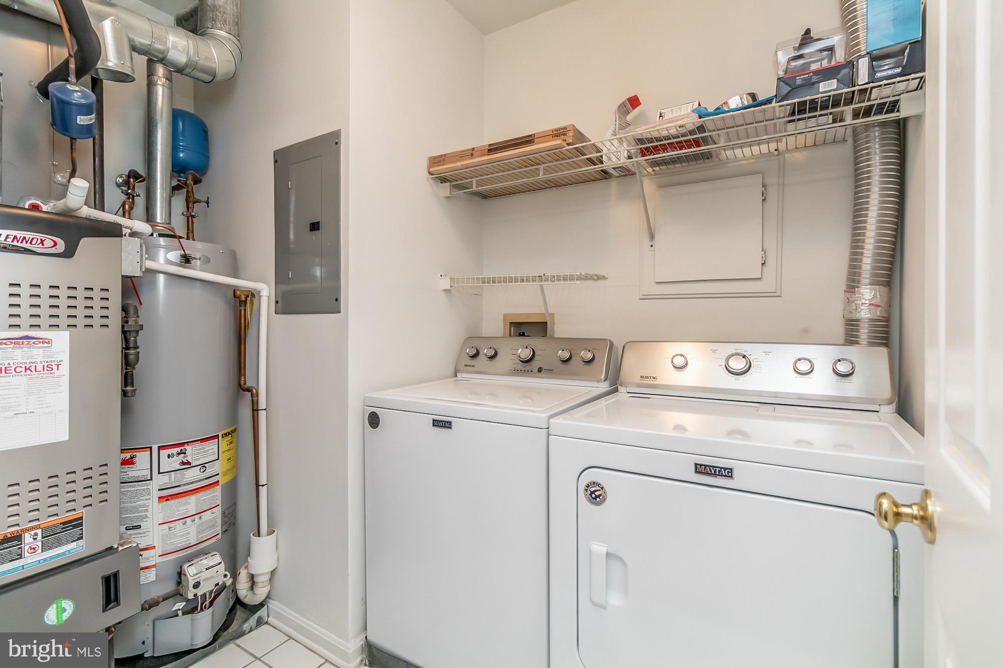 400 Kilree Road, Unit 302 Lutherville-Timonium, MD 21093 - Photo 13 of 23 Laundry with brand new Maytag washer and dryer
