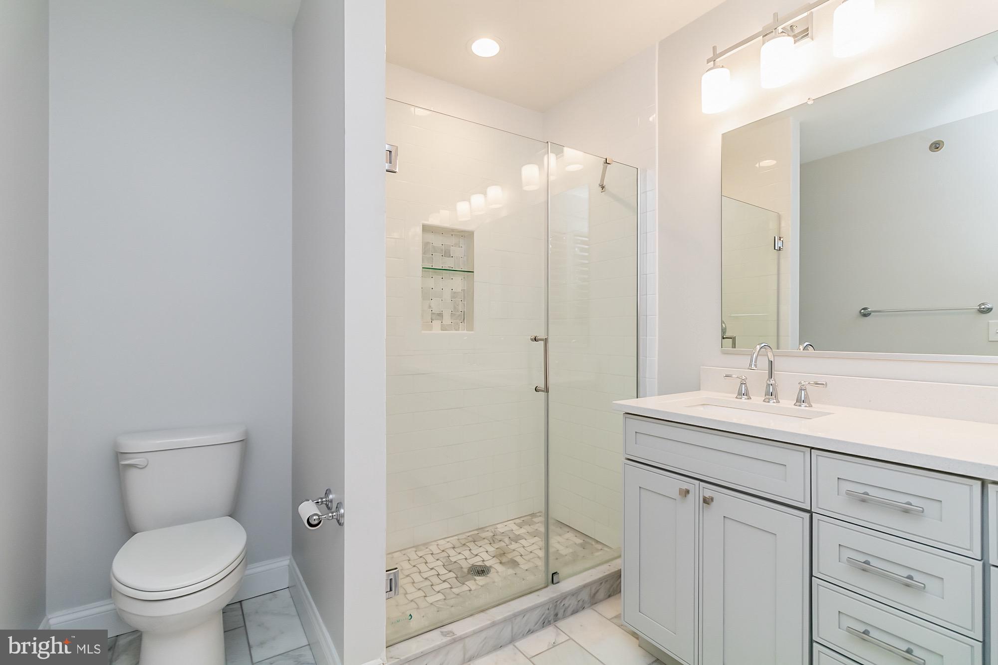 400 Kilree Road, Unit 302 Lutherville-Timonium, MD 21093 - Photo 18 of 23 Primary Bath /Carrara Marble