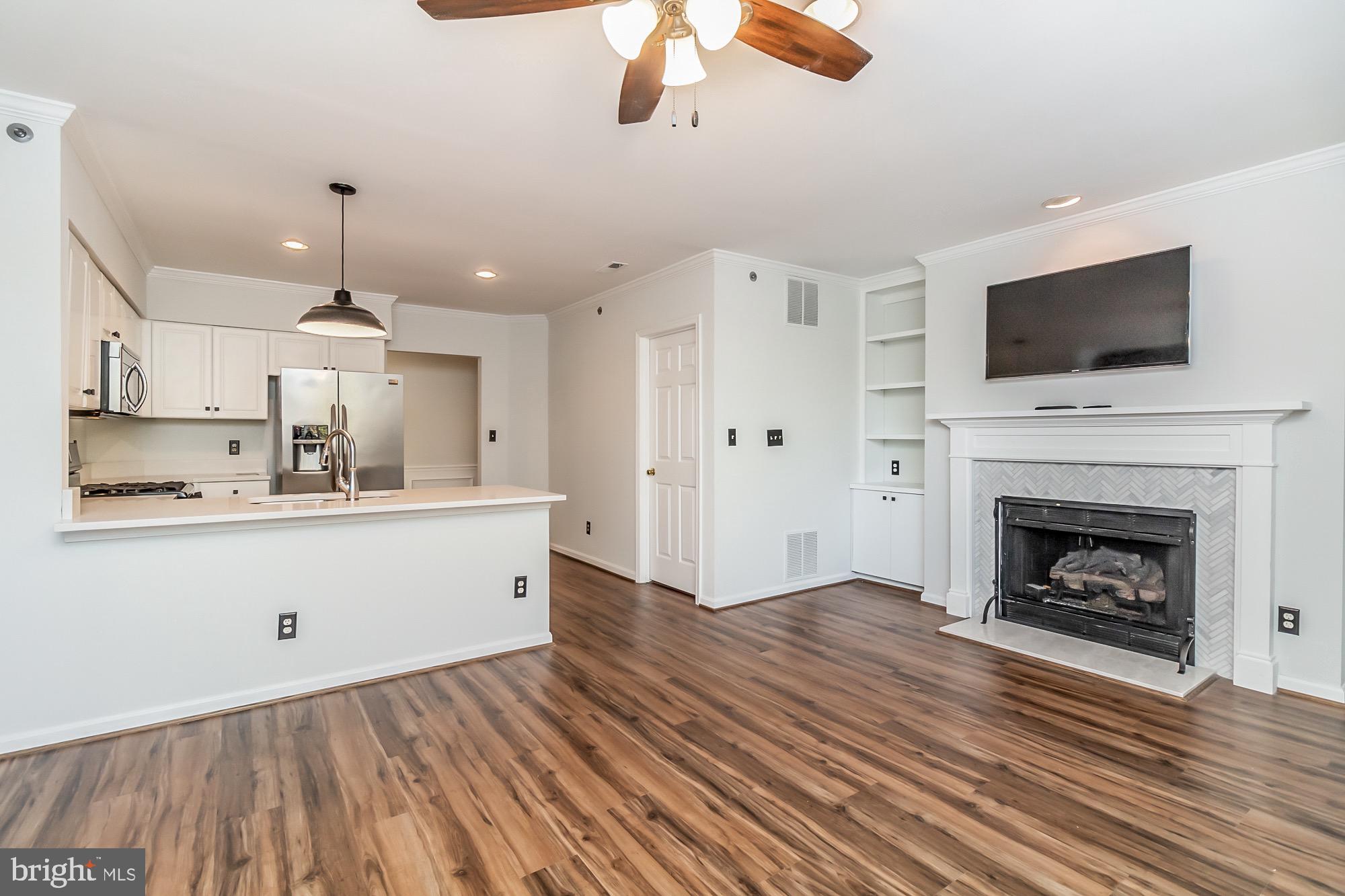400 Kilree Road, Unit 302 Lutherville-Timonium, MD 21093 - Photo 8 of 23 Eat in kitchen with gas fireplace