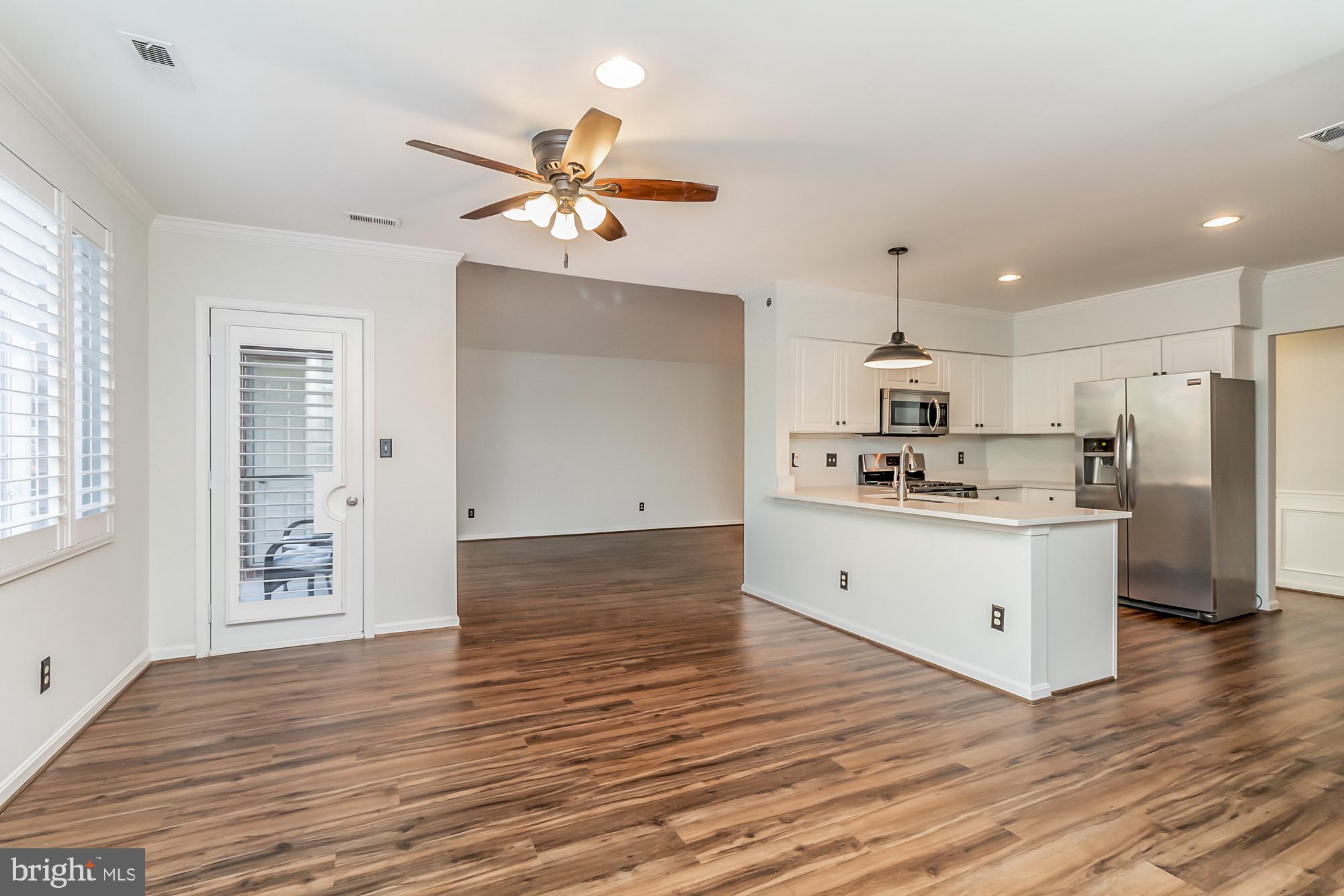 400 Kilree Road, Unit 302 Lutherville-Timonium, MD 21093 - Photo 10 of 23 Kitchen area with exit to porch