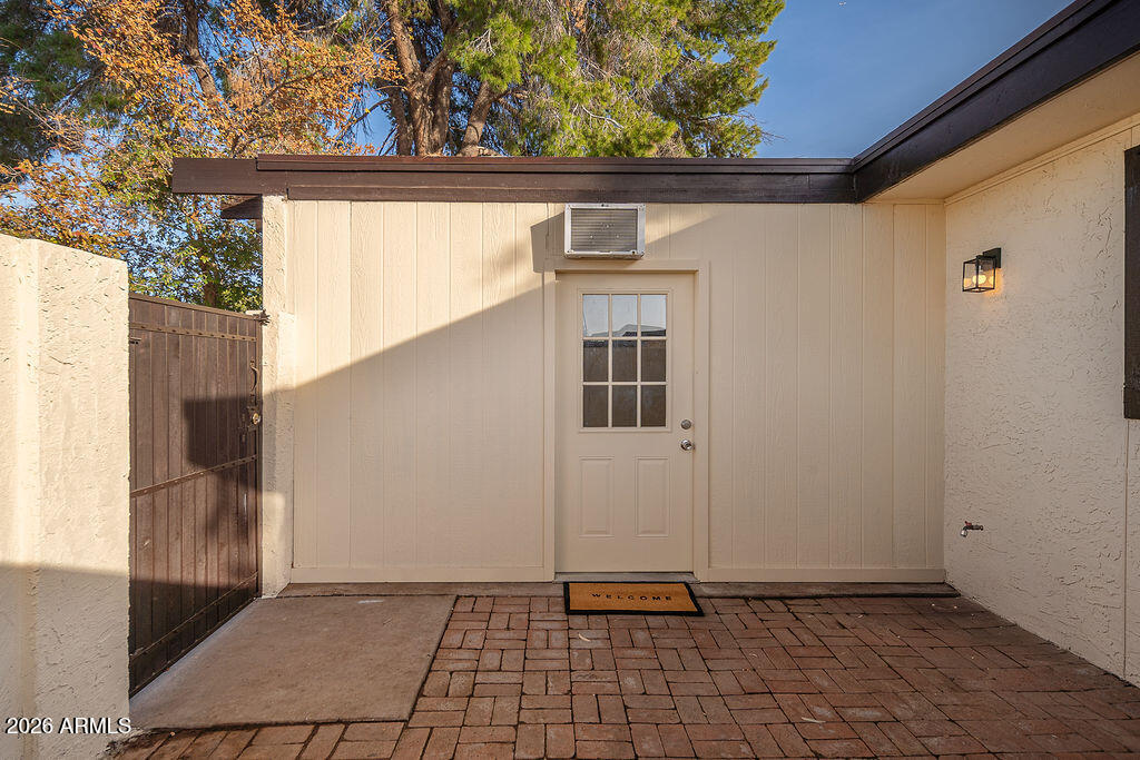 720 South Dobson Road, Unit 85 Mesa, AZ 85202 - Photo 14 of 16 a view of a door and a window