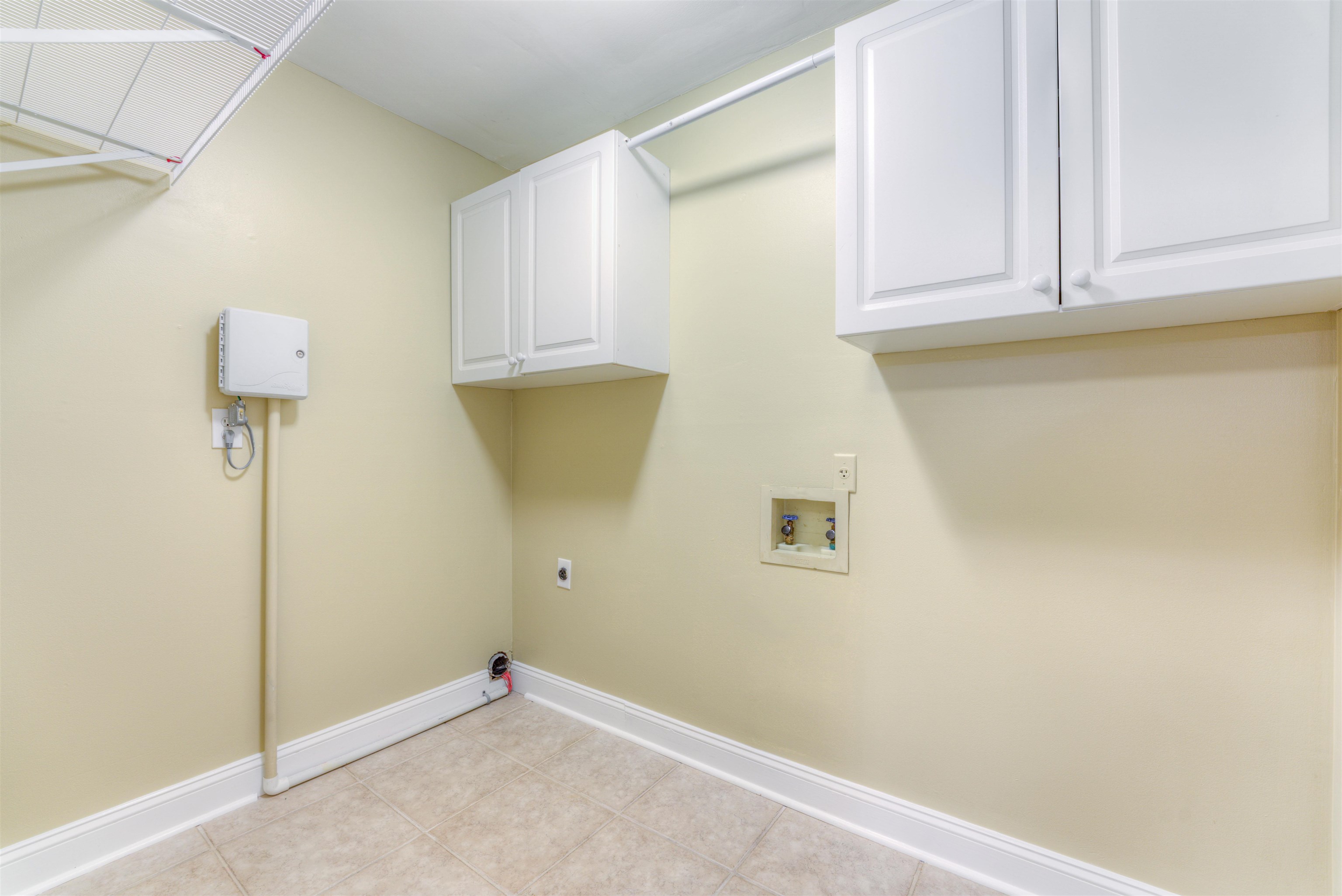 3385 Beaver Run Drive Collierville, TN 38017 - Photo 8 of 24 a view of storage and utility room with washer and dryer