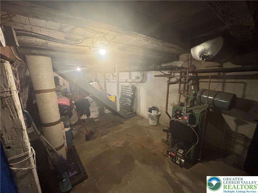 3404 North Ruch Street Whitehall, PA 18052 - Photo 31 of 36 A well-lit, unfinished basement offering ample storage and mechanical systems.