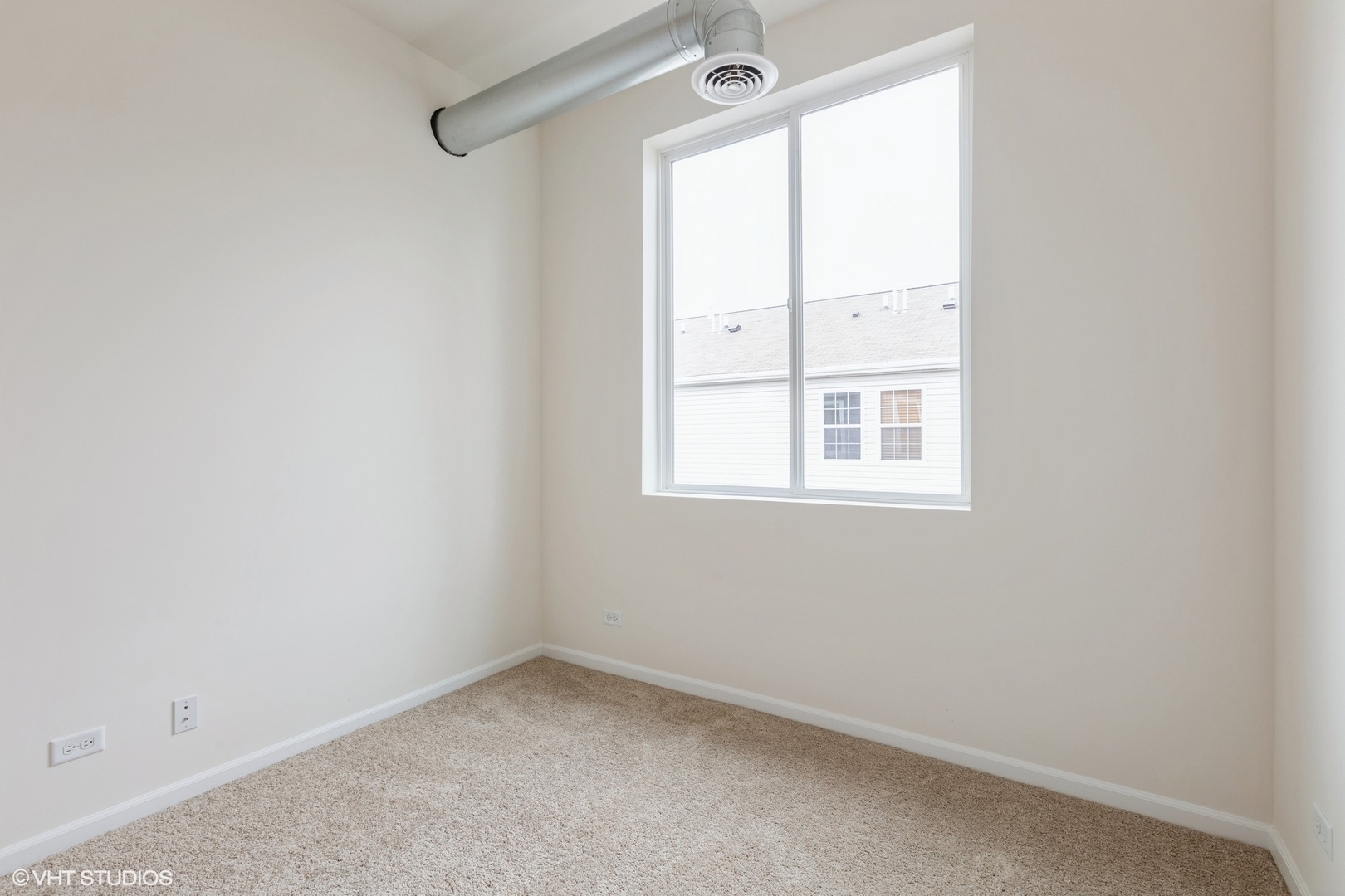 1690 Simms Street Aurora, IL 60504 - Photo 15 of 24 an empty room with a window
