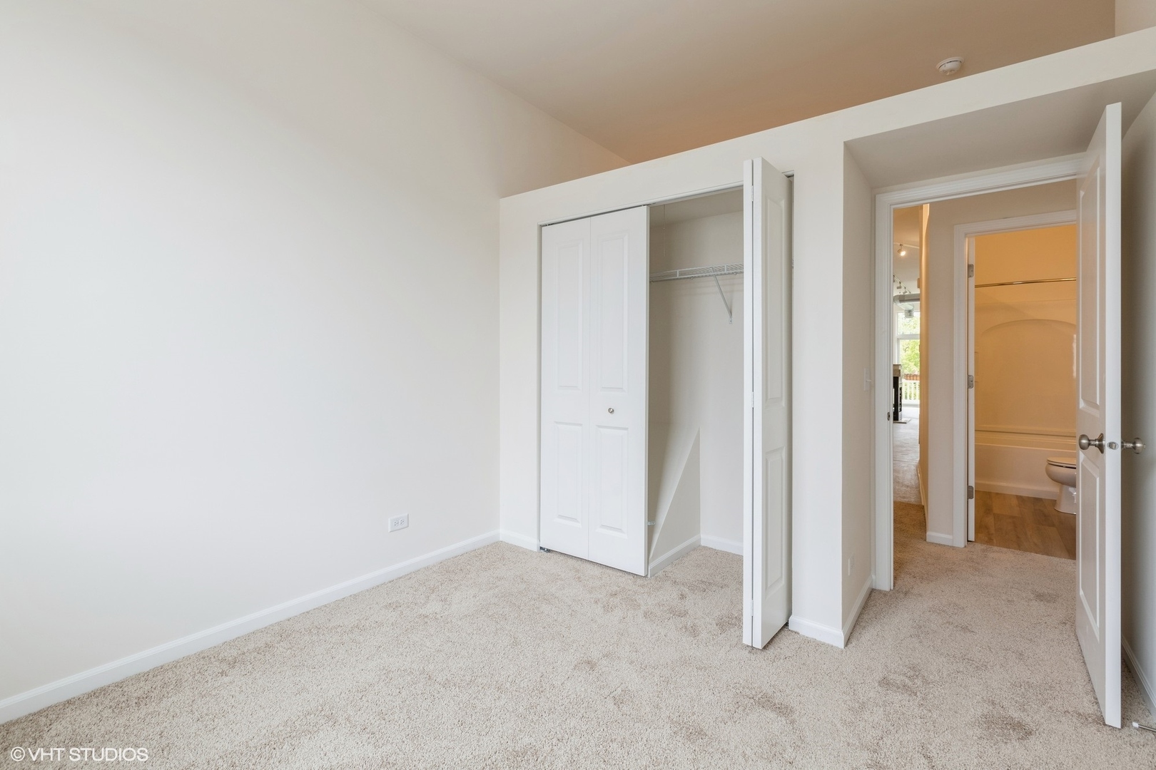 1690 Simms Street Aurora, IL 60504 - Photo 16 of 24 an empty room that has a grey walls