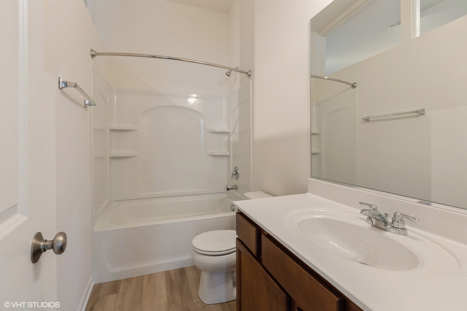 1690 Simms Street Aurora, IL 60504 - Photo 17 of 24 a bathroom with a granite countertop sink toilet and shower