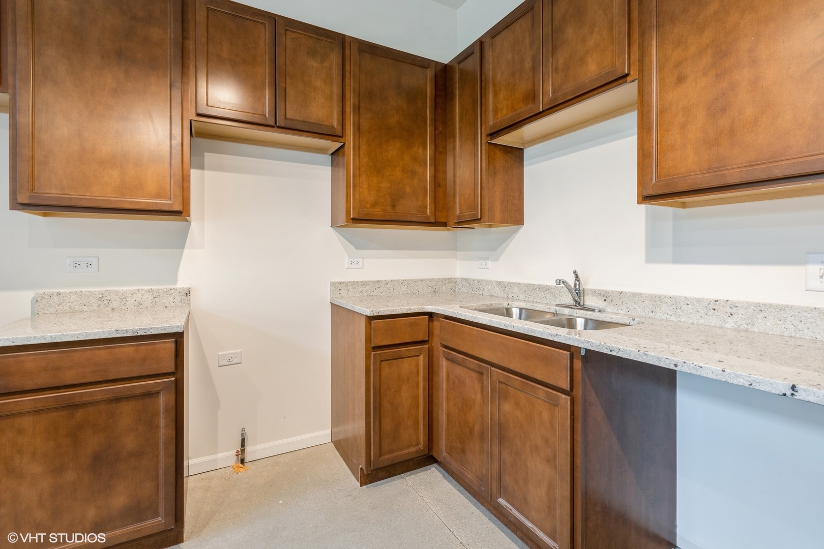 1690 Simms Street Aurora, IL 60504 - Photo 6 of 24 a kitchen with stainless steel appliances granite countertop a sink stove and refrigerator