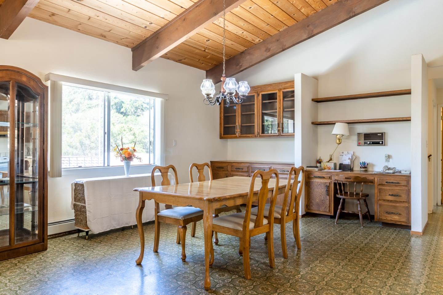 600 Hidden Valley Road Soquel, CA 95073 - Photo 10 of 34 a dining room with furniture a chandelier and wooden floor