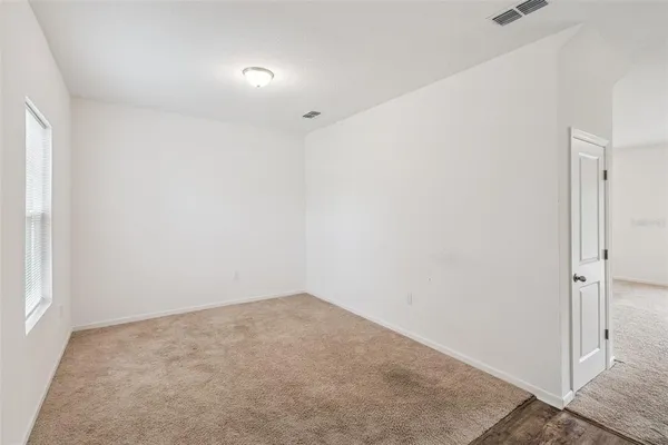 an empty room with a workbench