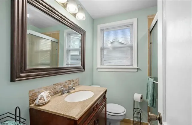 a bathroom with a sink and a toilet