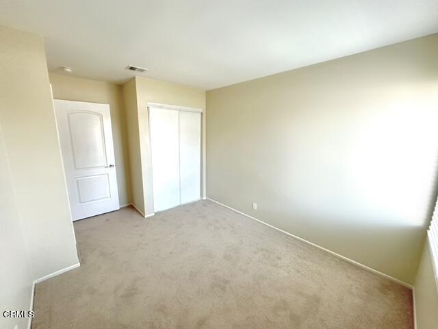 3701 Ketch Avenue, Unit D Oxnard, CA 93035 - Photo 20 of 28 an empty room with a natural light