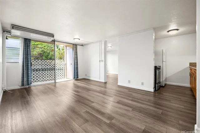 a view of a livingroom with wooden floor