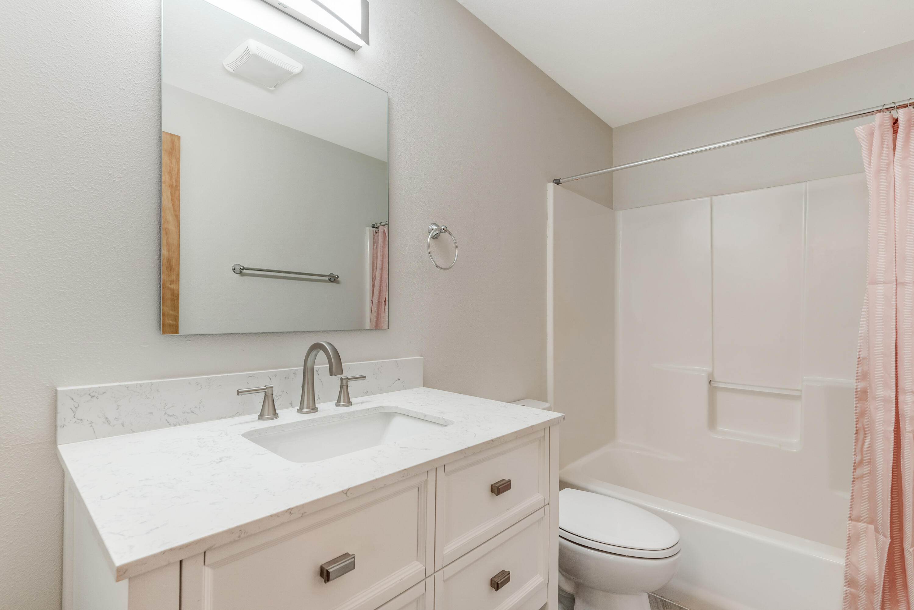1916 Northeast Wichita Way Bend, OR 97701 - Photo 15 of 38 a bathroom with a sink toilet a mirror and shower